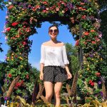 Montreal Botanical Garden floral arch Urban Planet off-the-shoulder top Forever 21 shorts sunglasses Asos sandals leather backpack (1)