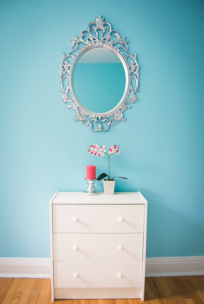 guest bedroom decor style interior decorating blue coral candle orchid Ikea ornate mirror dresser