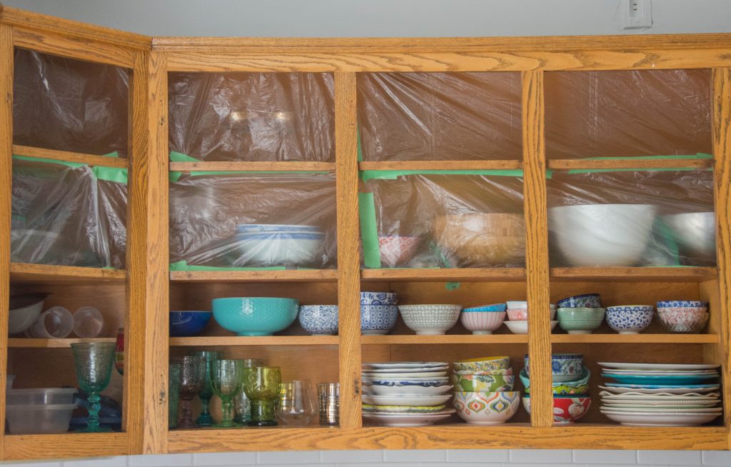 covering cabinets with plastic stain oak wood cabinets Montreal lifestyle DIY blog