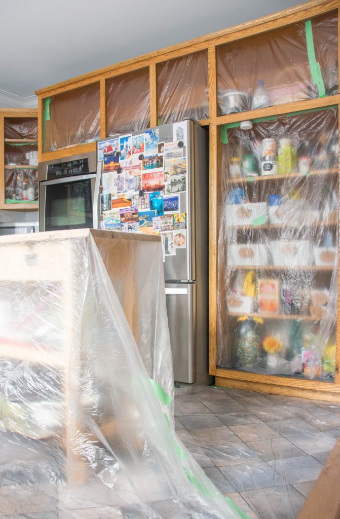 covering kitchen with plastic stain oak wood cabinets Montreal lifestyle DIY blog