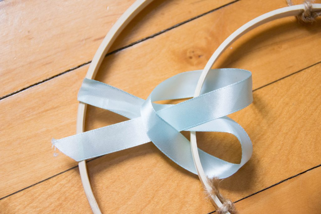 loop ribbon through hole DIY ribbon chandelier Montreal lifestyle blog